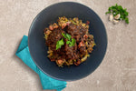 Rich braised beef with savoy cabbage, green lentils and smoked bacon
