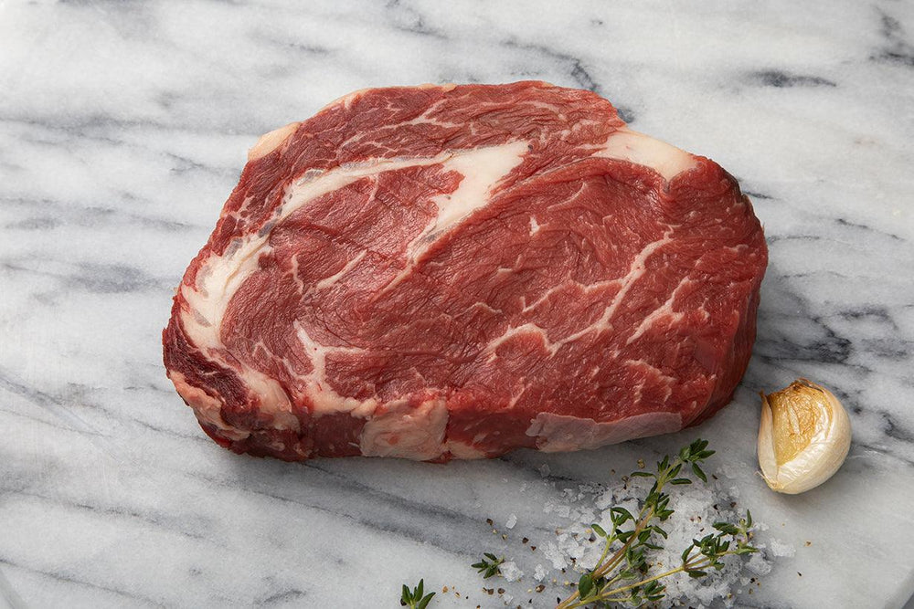 
                  
                    Load image into Gallery viewer, Scotch Beef Thick Ribeye Steak raw
                  
                